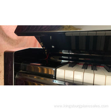 Wood grain grand piano is selling